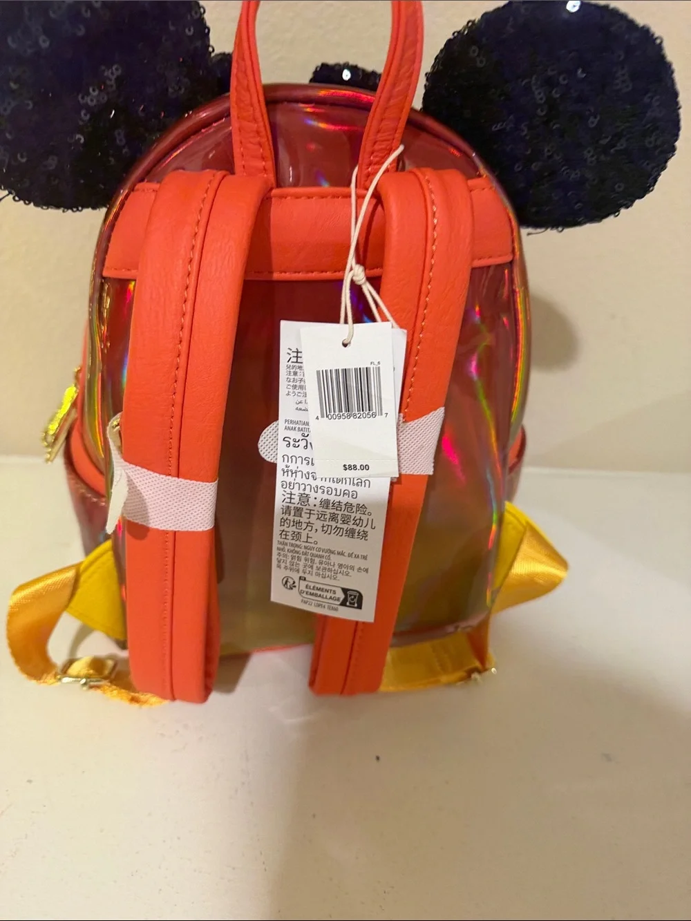 Loungefly Kids Iridescent Orange Mini Backpack with Black Sequin Bow & Ears